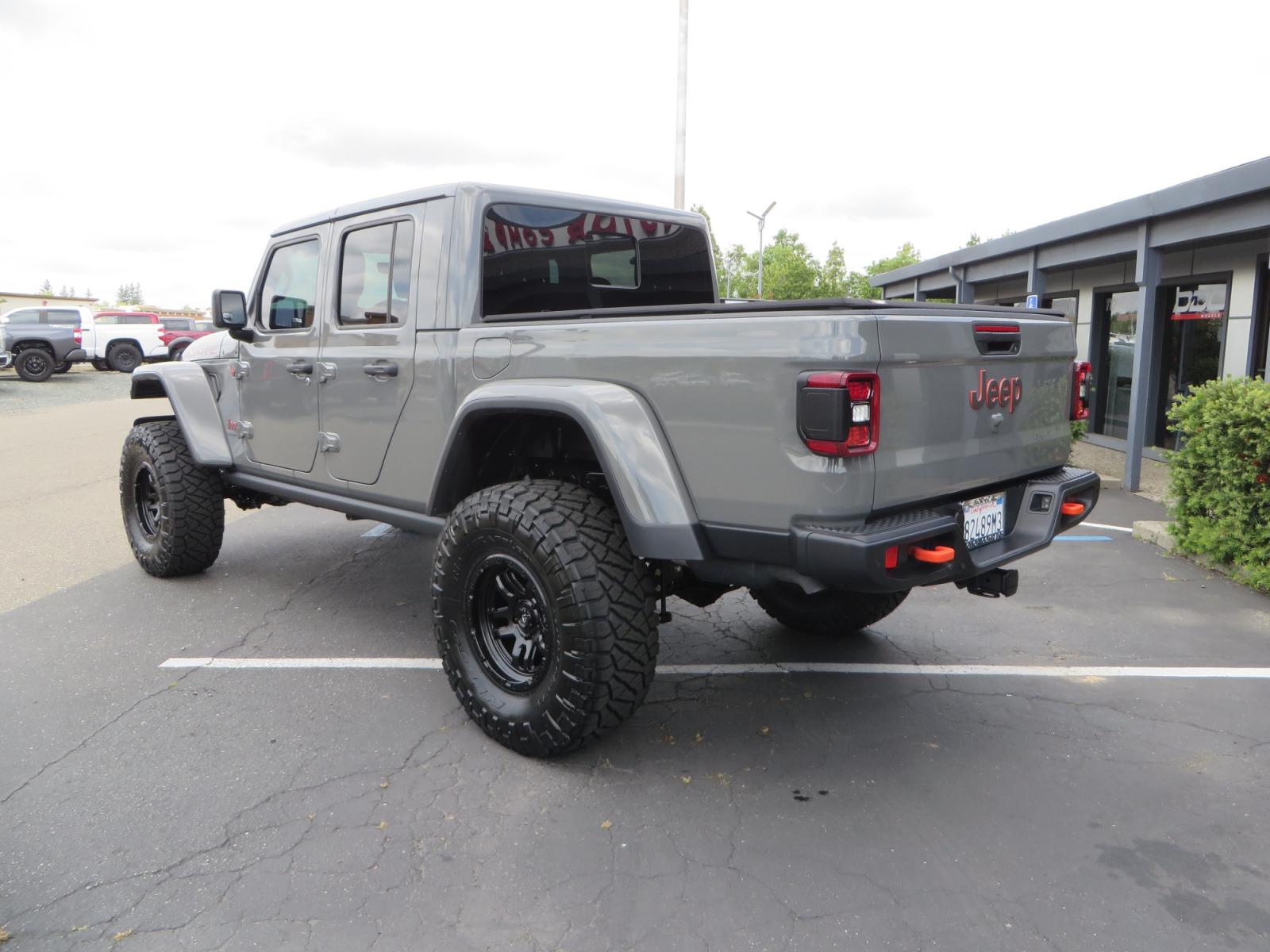 2021 Sting Grey /BLACK Jeep Gladiator Gladiator Mojave (1C6JJTEG4ML) with an 3.6L V6 engine, automatic transmission, located at 2630 Grass Valley Highway, Auburn, CA, 95603, (530) 508-5100, 38.937893, -121.095482 - Mojave Galdiator featuring a Readylift 4" suspension system, 37" Nitto Ridge Grappler tires, 17" Fuel Ammo wheels, Rugged Ridge bed cover, and window tint. - Photo #6